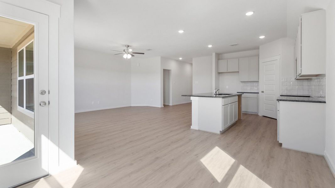 Representative furnished interior of a home built from the Blanton by Brightland Homes in Sunterra, Katy (Image 8).