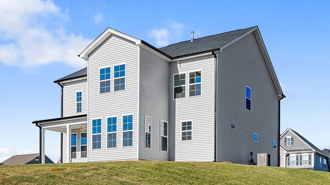 Exterior details and patio area of a home in Hanes Lake, Winston-Salem (Image 4).