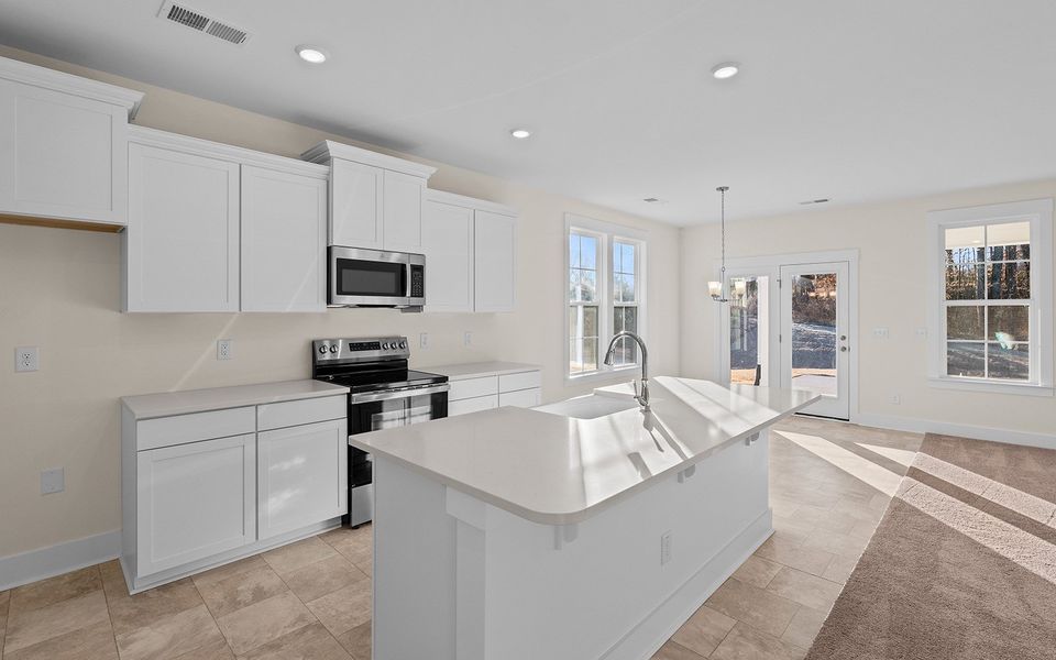 Furnished interior view inside a new home in Fieldstone, Lexington (Image 12).