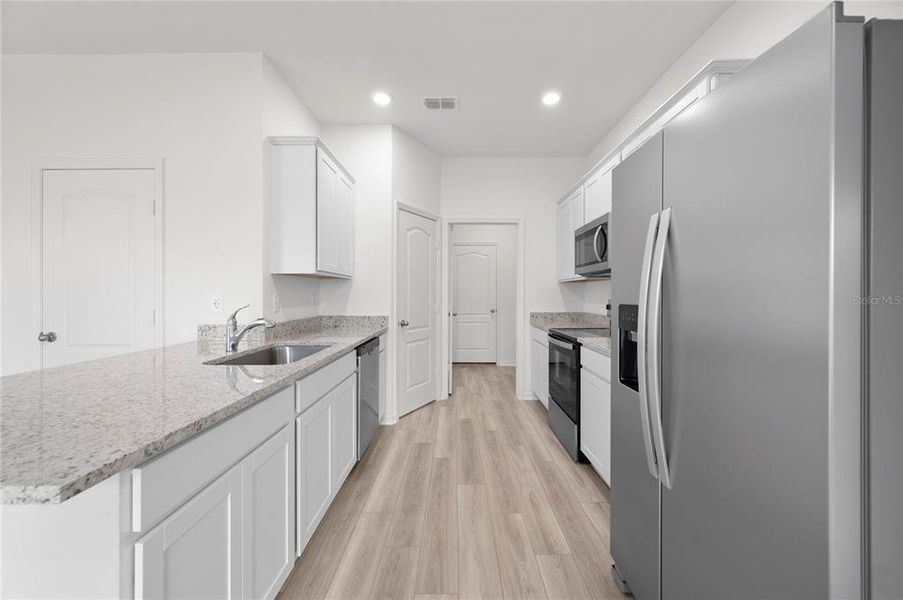 Furnished interior view inside a new home in Citrus Place, Babson Park (Image 7).
