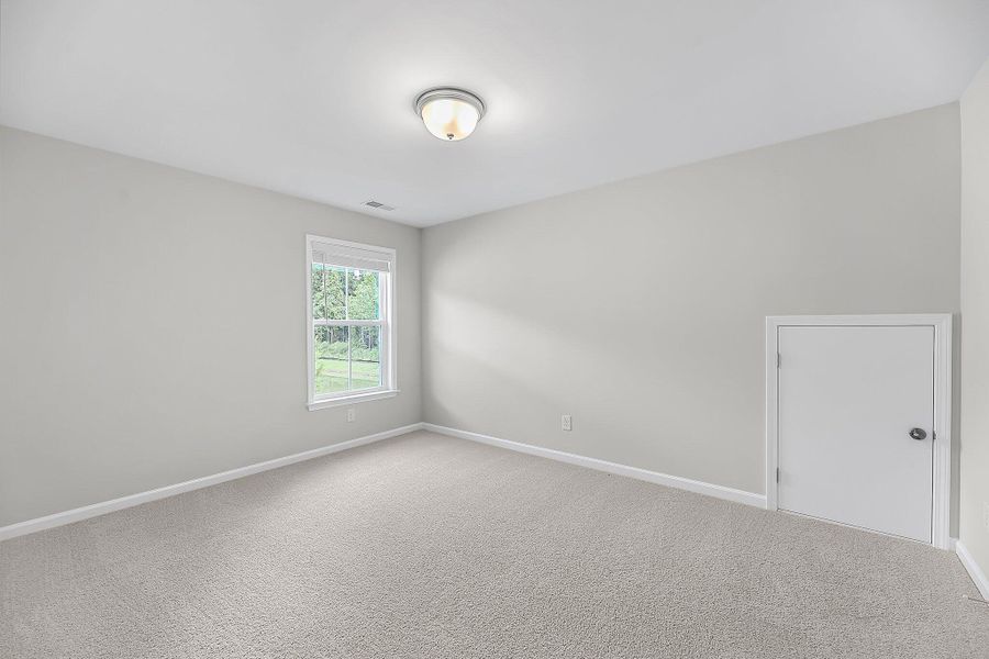Spacious, unfurnished interior of a new home in Sweetgrass Station, Summerville (Image 31).