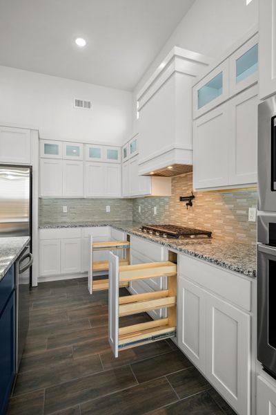 Representative furnished interior of a home built from the Scottsdale by LEH. Homes in Verdancia, El Paso (Image 15).