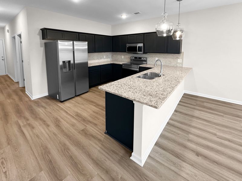 Furnished interior view inside a new home in Grand Reserve, Hinesville (Image 7).