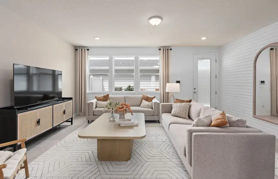 Representative furnished interior of a home built from the Trailwood - Interior Unit by Pulte Homes in Hilliard Isle, Kissimmee (Image 6). Representative furnished interior of a home built from the Trailwood - Interior Unit by Pulte Homes in Hilliard Isle, Kissimmee (Image 6).