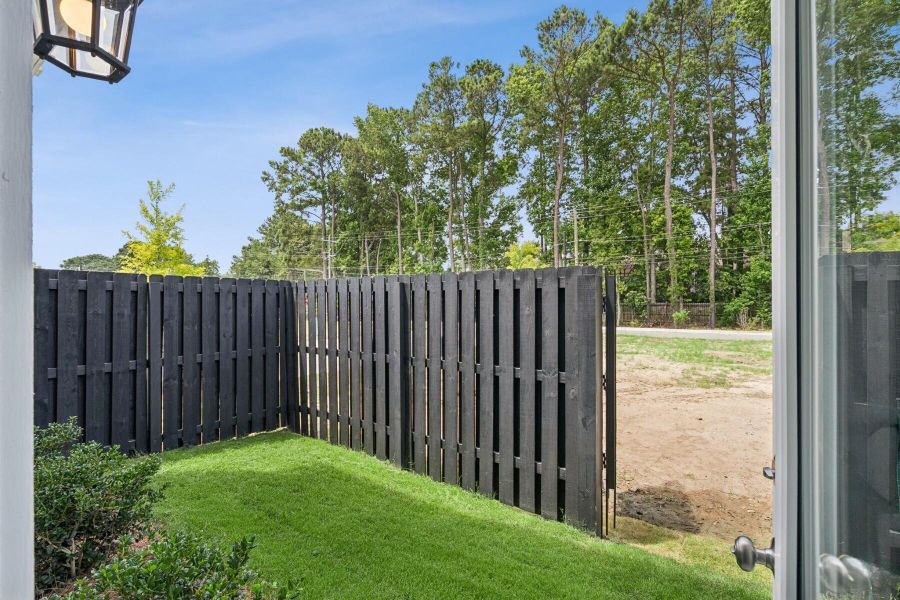 Exterior details and patio area of a home in , Charleston (Image 3).