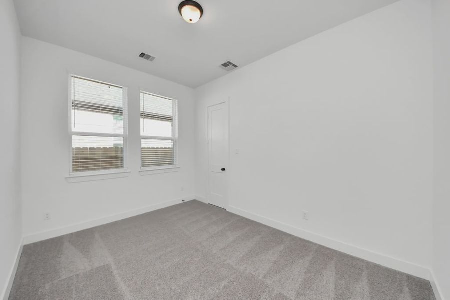 Representative unfurnished interior of a home built from the Summerton by Chesmar Homes in Meridiana 50's and 60's, Manvel (Image 52).