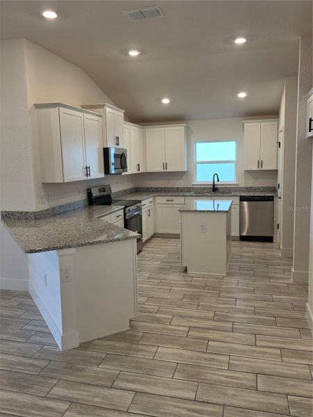 Furnished interior view inside a new home in Pine Bluff, Spring Hill (Image 3).