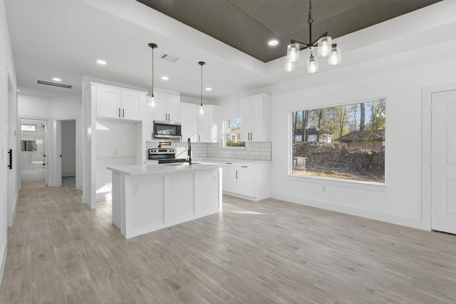 Furnished interior view inside a new home in , Willis (Image 11).