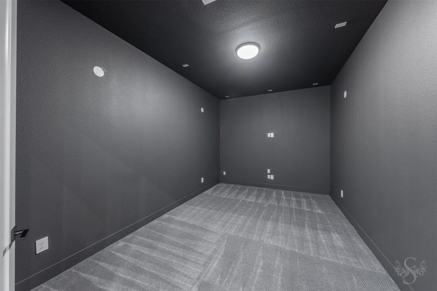 Media room, located downstairs. Media room, located downstairs.