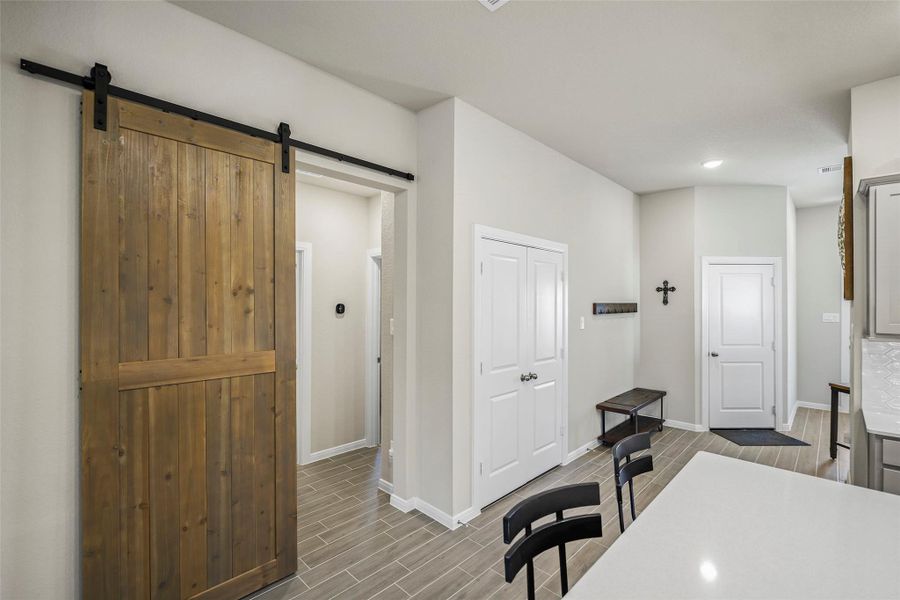 Furnished interior view inside a new home in The Highlands - Grove Collection, Porter (Image 12).
