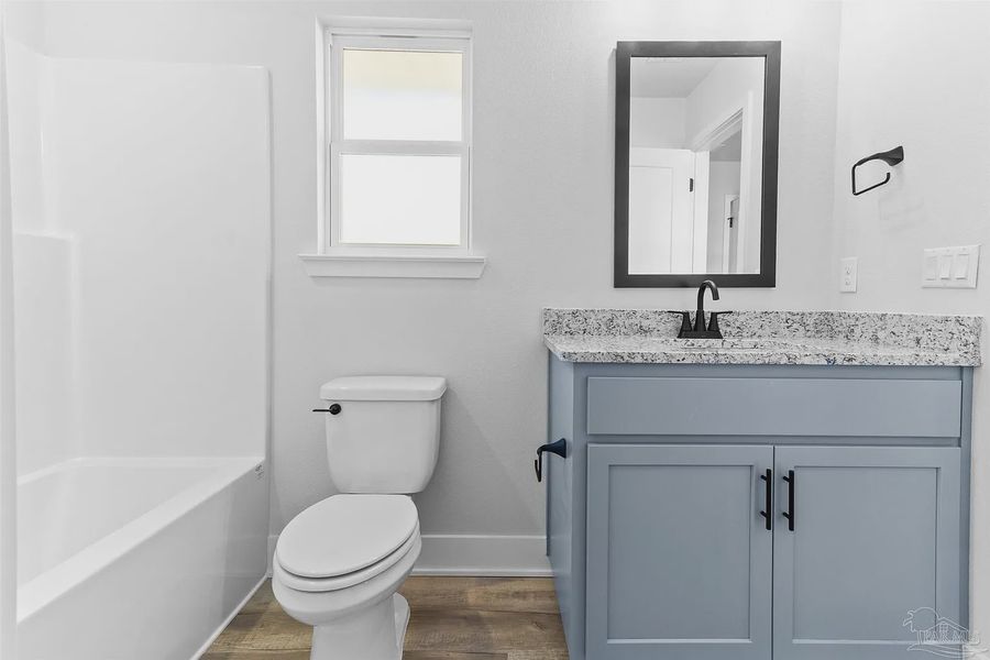 Furnished interior view inside a new home in Pecan Valley, Pensacola (Image 6).
