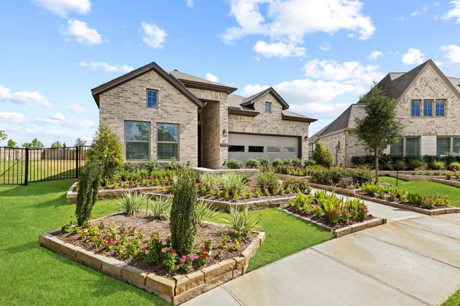 Front exterior of a new home in Nolina, Georgetown, TX, highlighting curb appeal (Image 20).