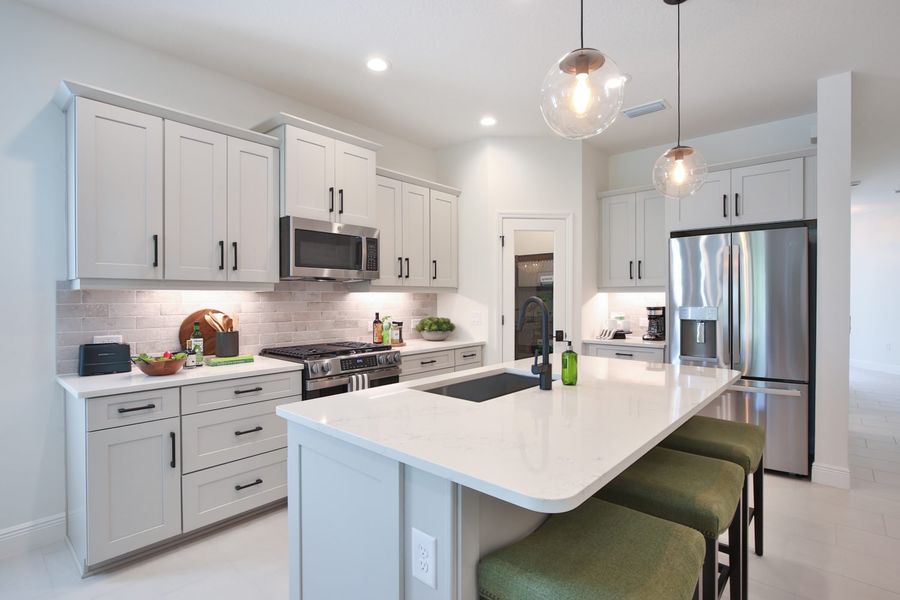 Representative furnished interior of a home built from the Dream 2 by Neal Communities in Boca Royale Golf & Country Club at Wellen Park, Englewood (Image 7).