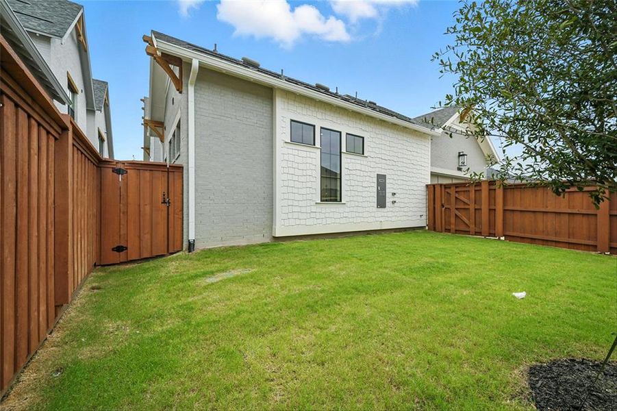 Front exterior of a new home in Fields, Frisco, TX, highlighting curb appeal (Image 2).