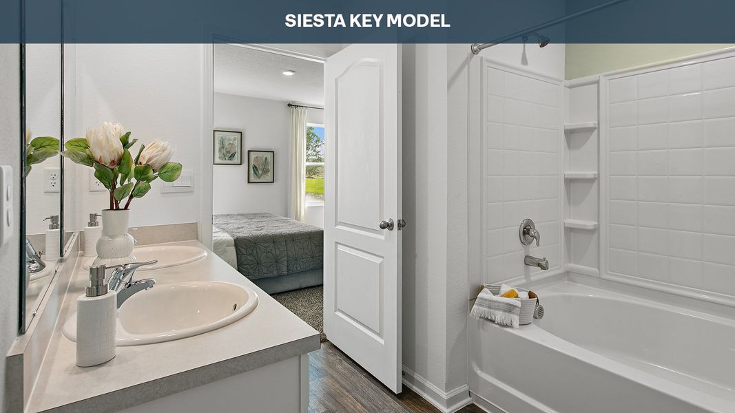 Representative furnished interior of a home built from the Siesta Key by D.R. Horton in Sawmill Branch Express, Palm Coast (Image 14).