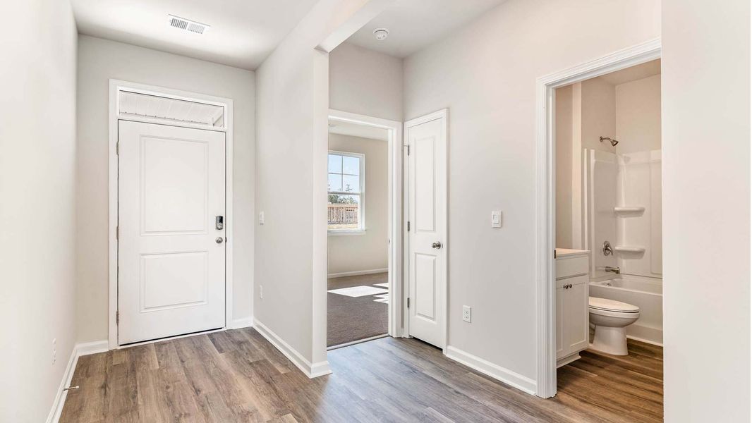 Representative unfurnished interior of a home built from the ARIA by D.R. Horton in Sandridge Park, Little River (Image 10).
