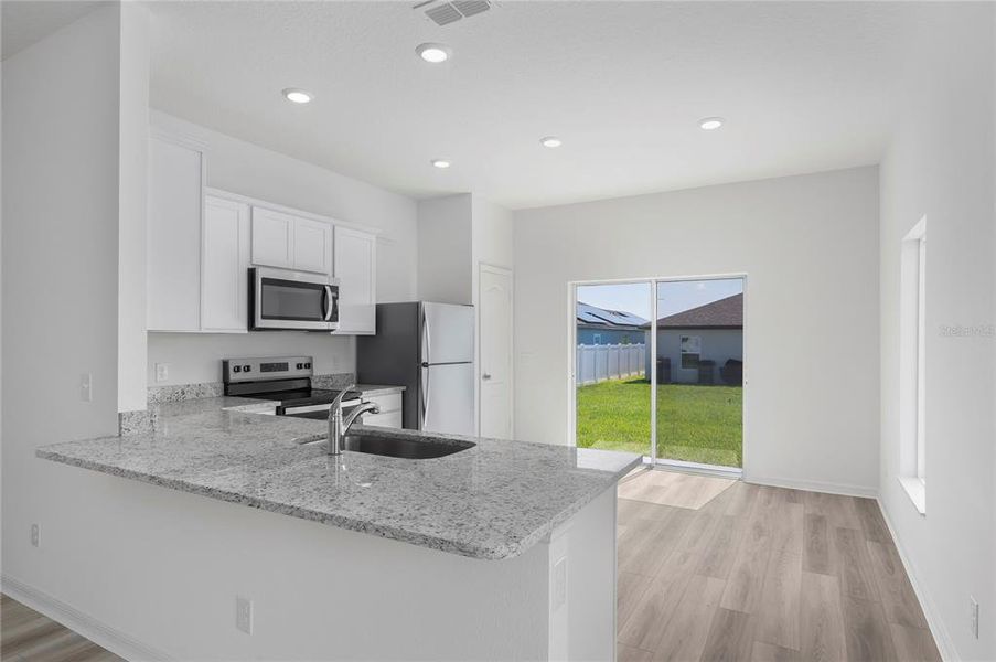 Furnished interior view inside a new home in Gum Lake Preserve, Lake Alfred (Image 7).