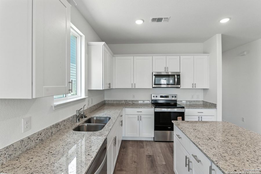 Furnished interior view inside a new home in Lily Springs, Seguin (Image 12). Furnished interior view inside a new home in Lily Springs, Seguin (Image 12).