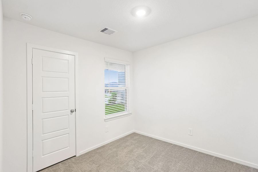 Spacious, unfurnished interior of a new home in Riviera Pines - Traditional Series, Conroe (Image 16).