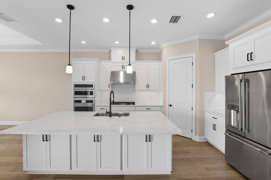 Furnished interior view inside a new home in Esplanade at Starling, Punta Gorda (Image 3). Furnished interior view inside a new home in Esplanade at Starling, Punta Gorda (Image 3).