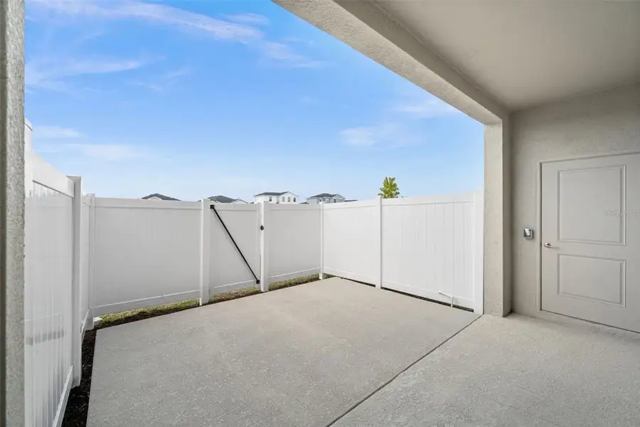 Exterior details and patio area of a home in Tuckers Cove, Punta Gorda (Image 4). Exterior details and patio area of a home in Tuckers Cove, Punta Gorda (Image 4).