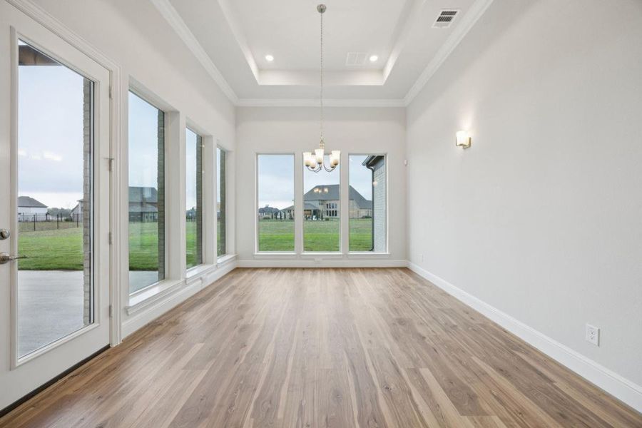 Representative unfurnished interior of a home built from the Grand Maison III by Grand Homes in Kings Crossing, Parker (Image 14).