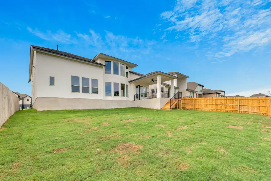 Exterior details and patio area of a home in Santa Rita Ranch - 60', Liberty Hill (Image 3). Exterior details and patio area of a home in Santa Rita Ranch - 60', Liberty Hill (Image 3).