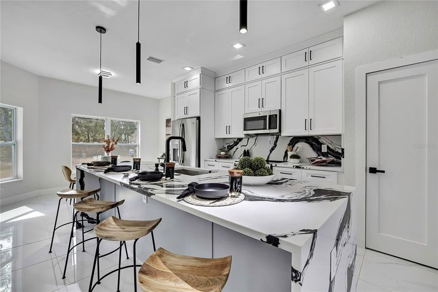Furnished interior view inside a new home in , Weeki Wachee (Image 36).