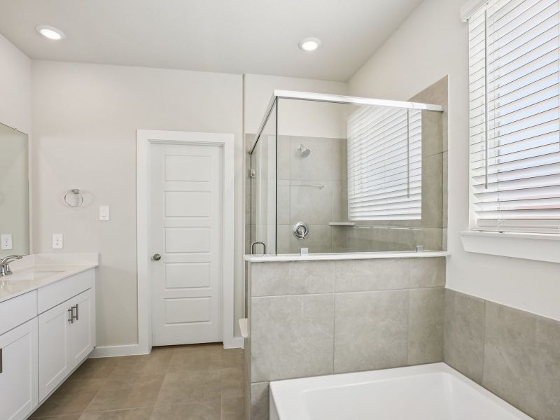 Furnished interior view inside a new home in Sundance Cove - Premier Series, Crosby (Image 7).