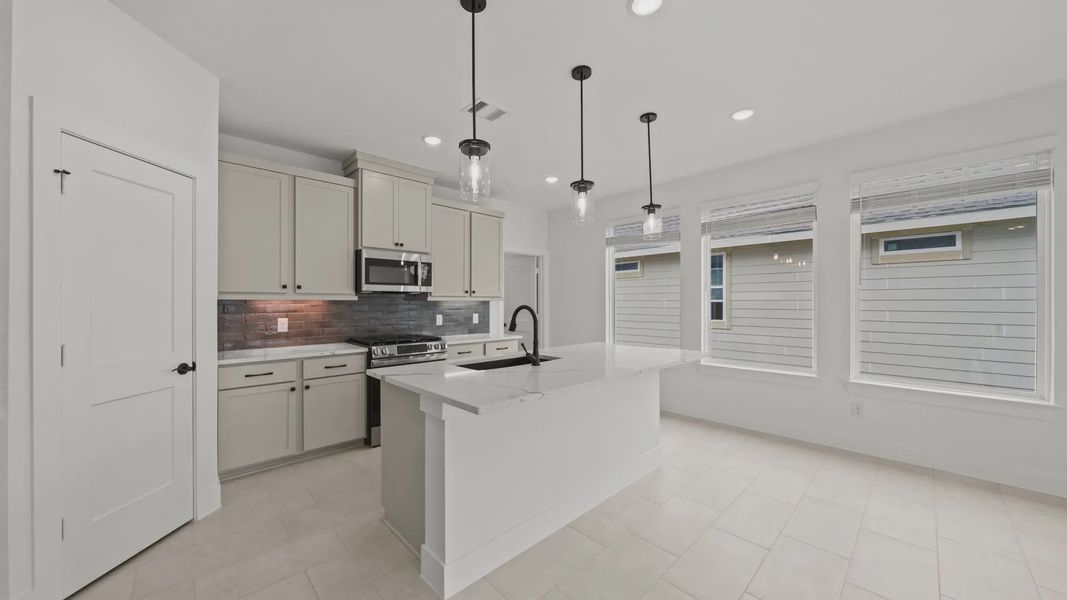 Furnished interior view inside a new home in Elyson Courtyard Collection, Katy (Image 9).
