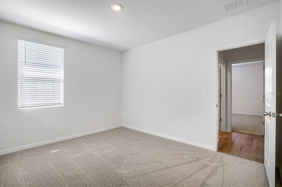 Spacious, unfurnished interior of a new home in Salt Meadows - Classic Series, Parrish (Image 17).