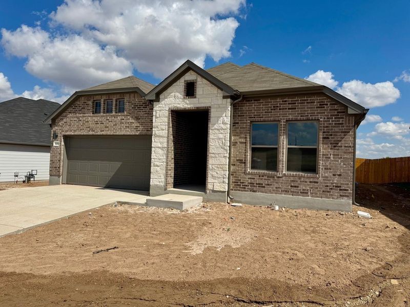 Exterior details and patio area of a home in Prairie Winds, Hutto (Image 15).