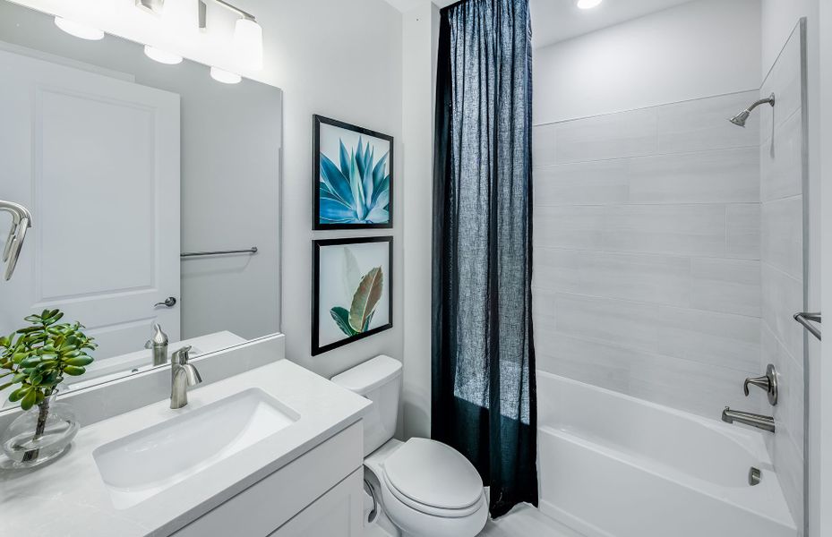 Furnished interior view inside a new home in Cedar Grove at The Woodlands, North Port (Image 9).