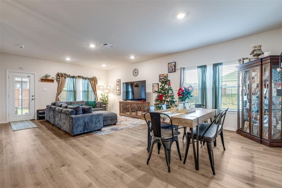 Dining area featuring light wood-style flooring, recessed lighting, and healthy amount of natural light Dining area featuring light wood-style flooring, recessed lighting, and healthy amount of natural light