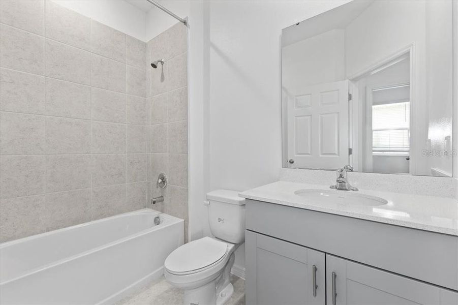 Furnished interior view inside a new home in Highfield at Twisted Oaks, Wildwood (Image 2).