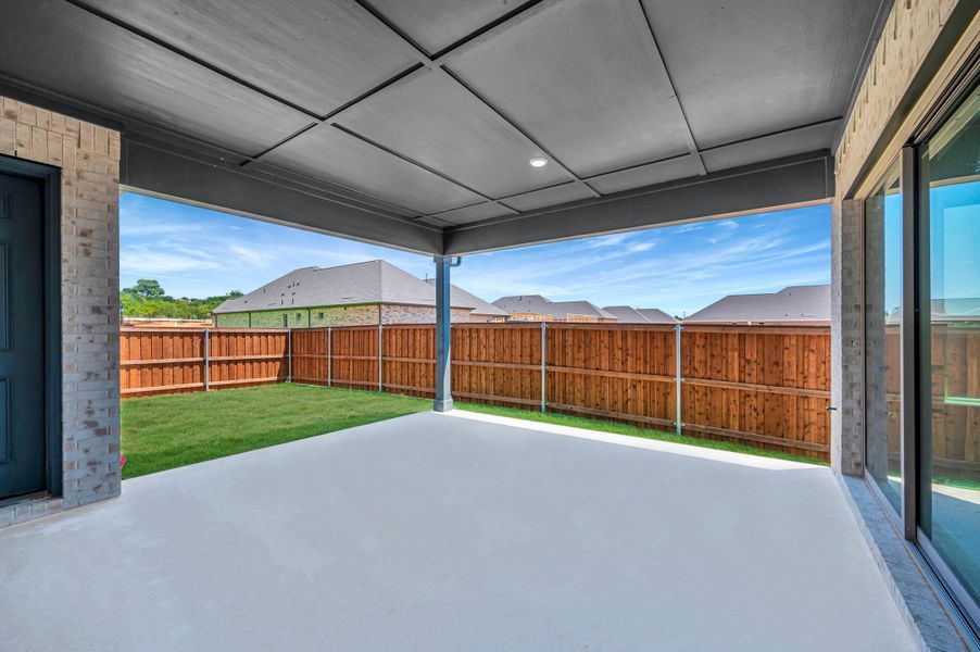 Exterior details and patio area of a home in Elements at Viridian - Traditional Series, Arlington (Image 3). Exterior details and patio area of a home in Elements at Viridian - Traditional Series, Arlington (Image 3).