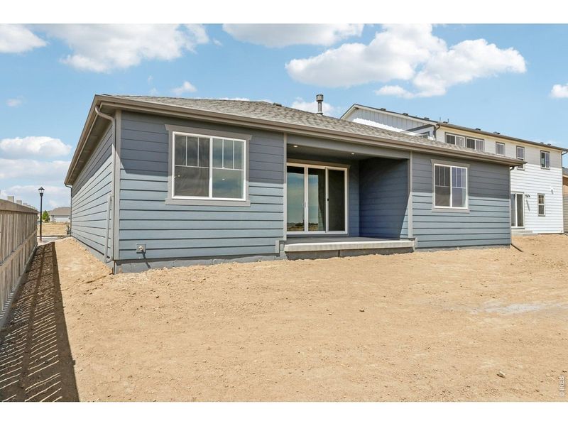 Exterior details and patio area of a home in Farmstead, Berthoud (Image 4).