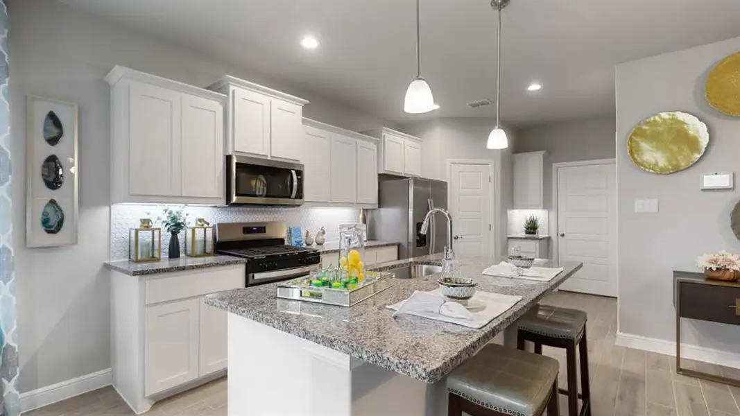 Kitchen - All Home and community information, including pricing, included features, terms, availability and amenities, are subject to change at any time without notice or obligation. All Drawings, pictures, photographs, video, square footages, floor plans, elevations, features, colors and sizes are approximate for illustration purposes only and will vary from the homes as built. Kitchen - All Home and community information, including pricing, included features, terms, availability and amenities, are subject to change at any time without notice or obligation. All Drawings, pictures, photographs, video, square footages, floor plans, elevations, features, colors and sizes are approximate for illustration purposes only and will vary from the homes as built.