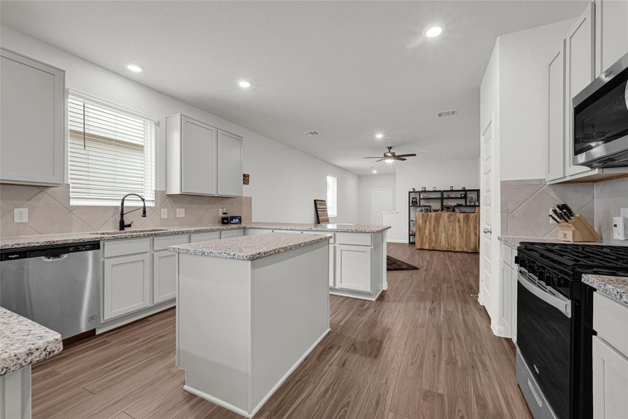 Furnished interior view inside a new home in River's Edge, Conroe (Image 6).