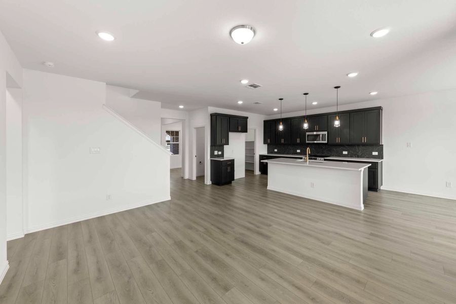 Open Kitchen-Living Room featuring the Noir Collection