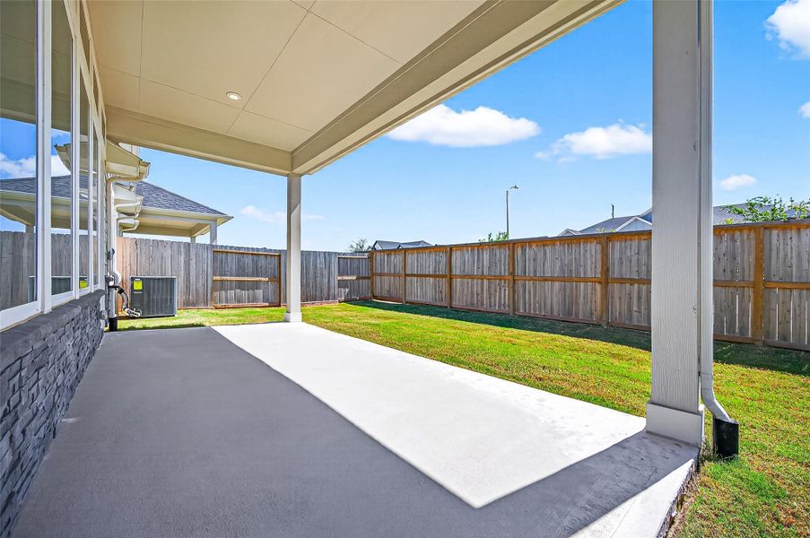 Exterior details and patio area of a home in Jordan Ranch: Signature Series, Katy (Image 23).