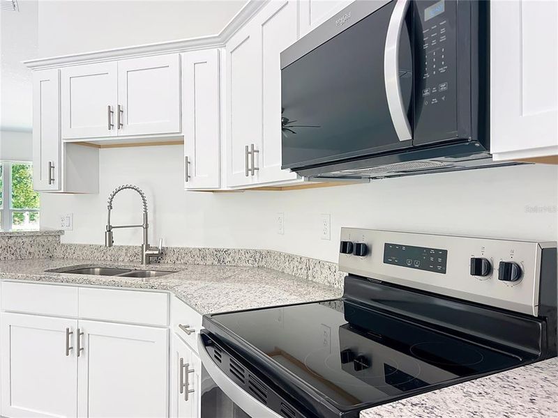 Furnished interior view inside a new home in , Dunnellon (Image 11).