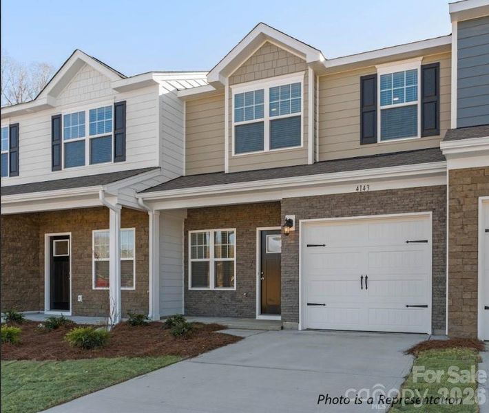 Front exterior of a new home in Sierra Ridge, Gastonia, NC, highlighting curb appeal (Image 1). Front exterior of a new home in Sierra Ridge, Gastonia, NC, highlighting curb appeal (Image 1).