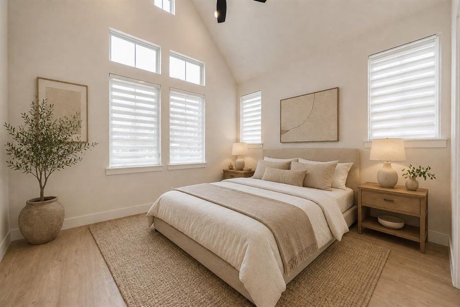 Vaulted ceiling featuring a dark-toned ceiling fan