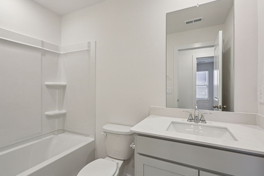 Furnished interior view inside a new home in Greystone - Highland Townhomes, Smyrna (Image 7).