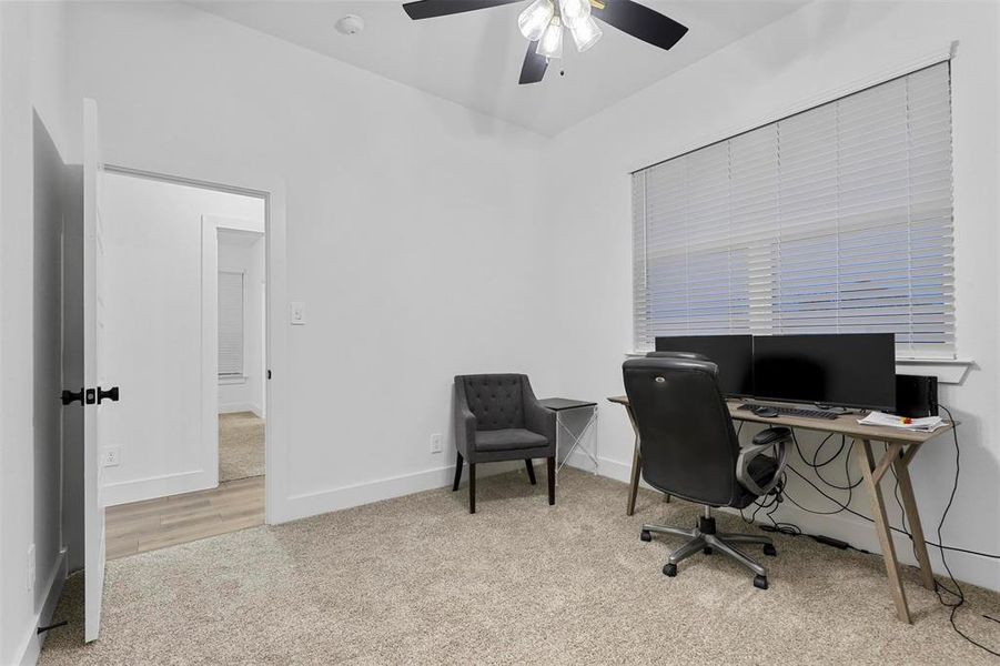 Office area featuring ceiling fan and light hardwood / wood-style flooring