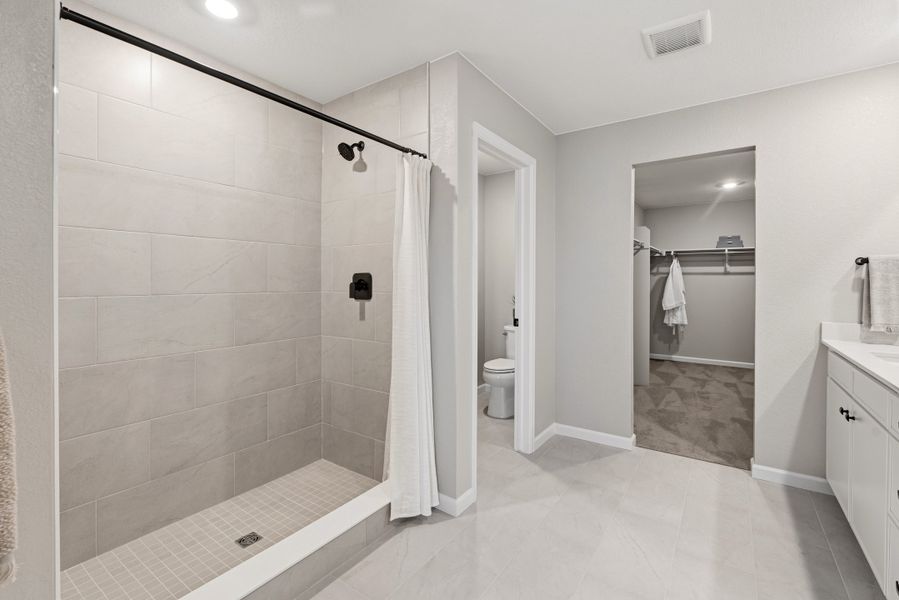 Representative furnished interior of a home built from the 4008 by Risewell Homes in Harvest Crossing, Aurora (Image 14).