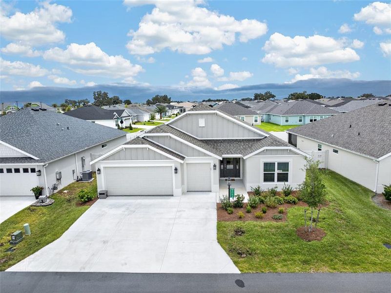 Front exterior of a new home in , The Villages, FL, highlighting curb appeal (Image 2). Front exterior of a new home in , The Villages, FL, highlighting curb appeal (Image 2).