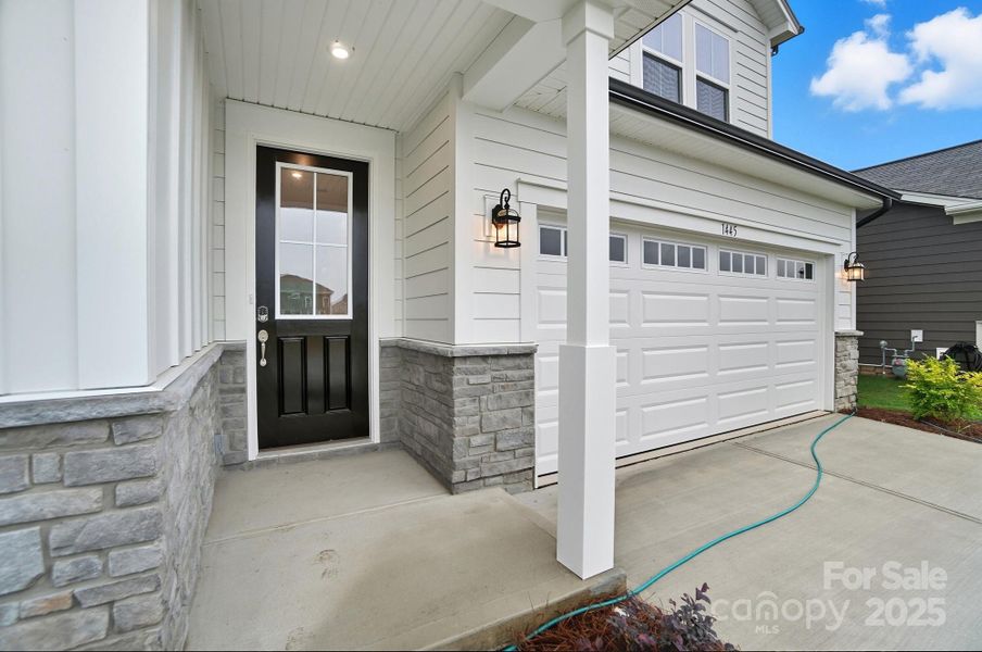 Exterior details and patio area of a home in Waxhaw Landing, Monroe (Image 3). Exterior details and patio area of a home in Waxhaw Landing, Monroe (Image 3).