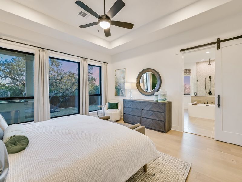 Representative furnished interior of a home built from the Topaz II by Giddens Homes in Riverstone, Georgetown (Image 42).